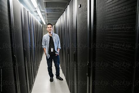 Portrait O A Smiling Asian Server Room Technician By Stocksy