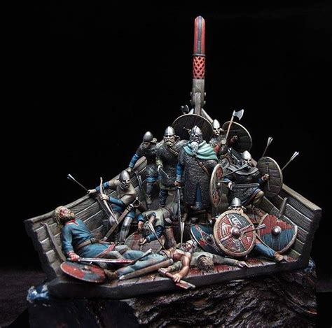 A Group Of Figurines Are Sitting On Top Of A Boat With Swords And Armor