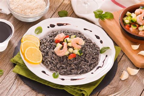 Squid ink risotto. stock photo. Image of herb, fresh - 169617608