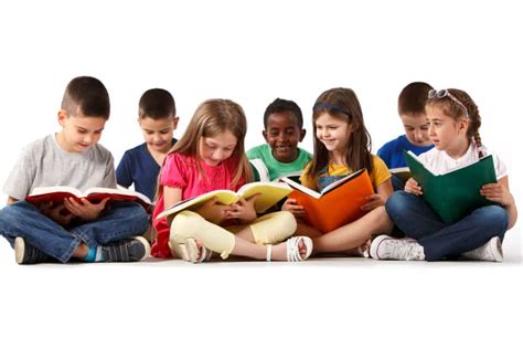 Group of happy school children reading books - Rooted in Rights