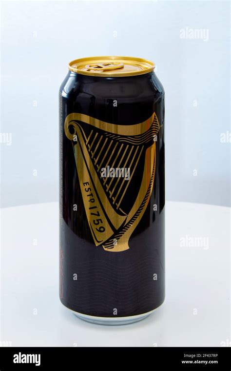 Calgary, Alberta, Canada. March 12, 2021. A Can of Guinness Beer draught nitrogen filled capsule ...