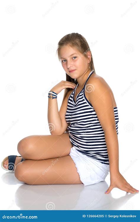 A Teenage Girl Is Sitting On The Floor Stock Image Image Of