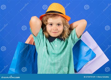 Kid with Many Shopping Bags in Studio. Funny Little Boy in Summer ...