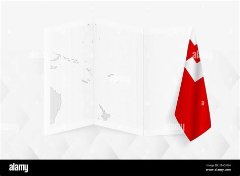 A grayscale map of Tonga with a hanging Tongan flag on one side. Vector map for many types of ...