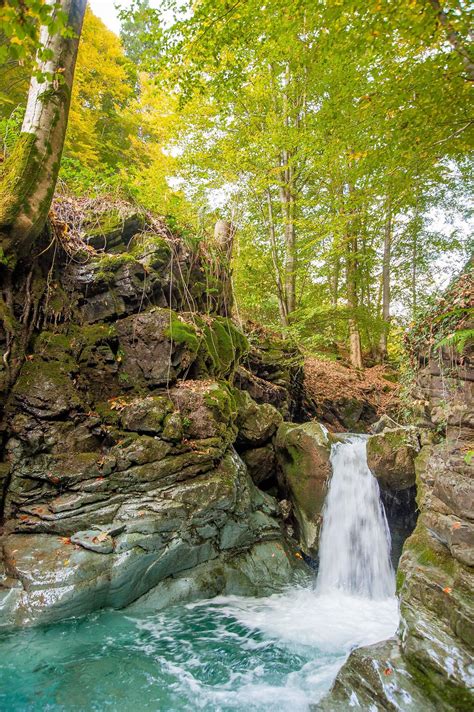 Waterfall on the river in autumn 5249002 Stock Photo at Vecteezy