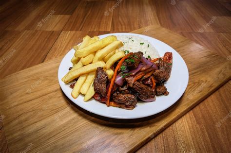 Premium Photo Peruvian Food Lomo Saltado French Fries With Meat