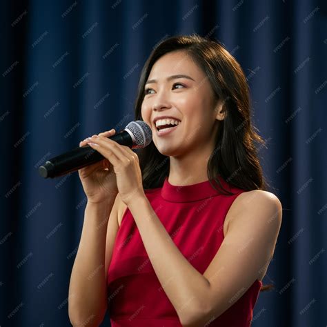 Premium Photo A Woman Singing Into A Microphone With The Word Quot On The Front