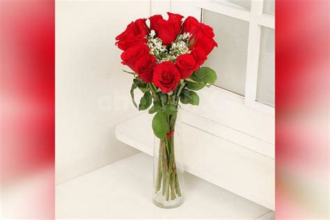 Send A Simple Heart Shaped Arrangement Of 15 Red Roses In Glass Vase To