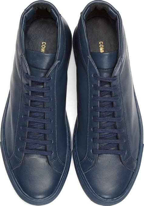 Common Projects Navy Leather Original Achilles Midtop Sneakers In Blue