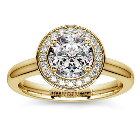 Halo Diamond Engagement Ring In Yellow Gold 1 4 Ctw