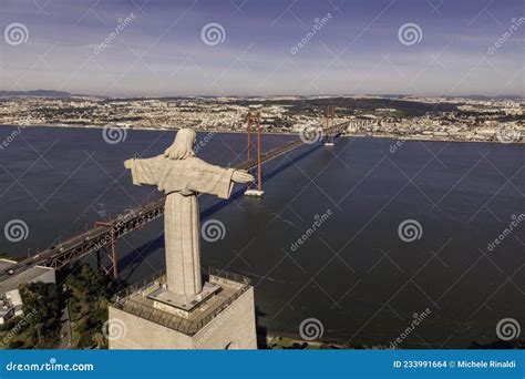 Aerial View Of April 25th Bridge And Cristo Rei Christ The King At