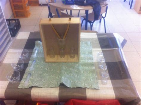 There Is A Table That Has Been Made Out Of Glass And Some Other Items On It