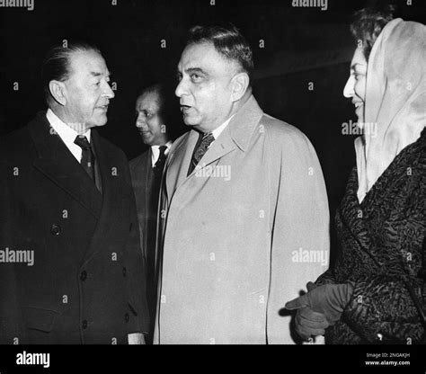 President Iskander Mirza of Pakistan, center, is shown after he arrived ...