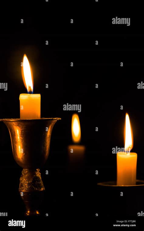 Burning Candles At Night Stock Photo Alamy