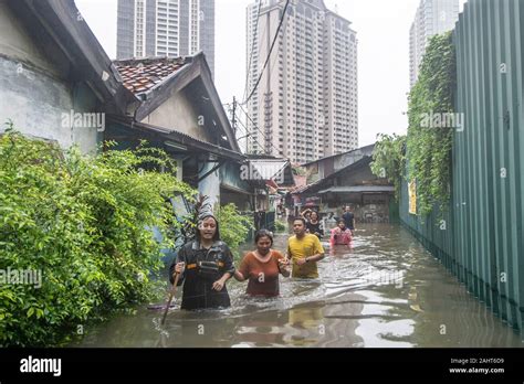 Jakarta Indonesia 1st Jan 2020 People Wade In The Floods In Jakarta