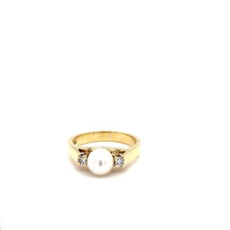 14 Kt Gelbgold Ring 0 20 Ct Diamant Perle Catawiki