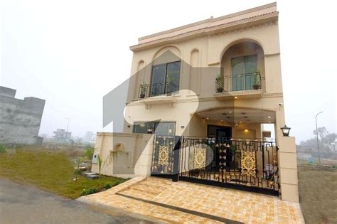 Marla Brand New Modern Design House For Sale Near Park Dha Town Dha