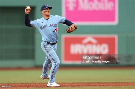 Matt Chapman Of The Toronto Blue Jays Throws To First In An Attempt