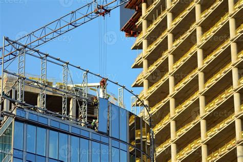 High Rise Building Under Construction Installation Of Glass Facade