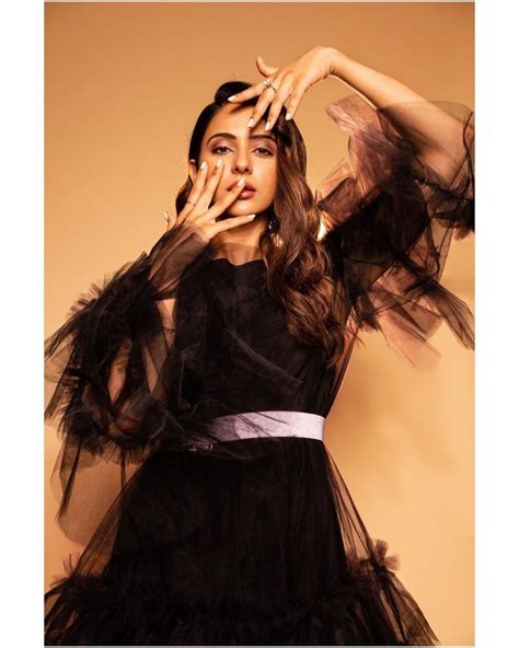 Rakul Preet Singh Paints Perfect Beach Pics With A Pretty Printed Blue Bikini StarBiz