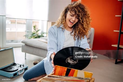 Smiling Girl Holding Vinyl Record High Res Stock Photo Getty Images