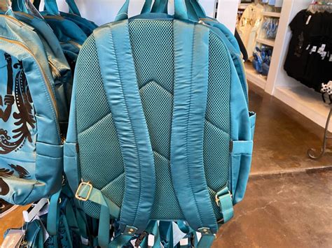 Haunted Mansion Loungefly Backpack Pins And More Arrive At Disneyland