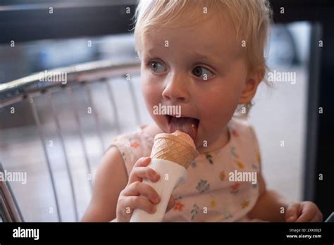 Baby Girl Kid Hold Big Ice Cream In Waffles Cone Stock Photo Alamy