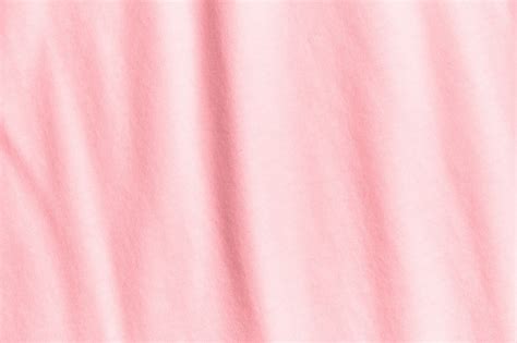 Premium Photo | Texture and background of crumpled pastel pink fabric