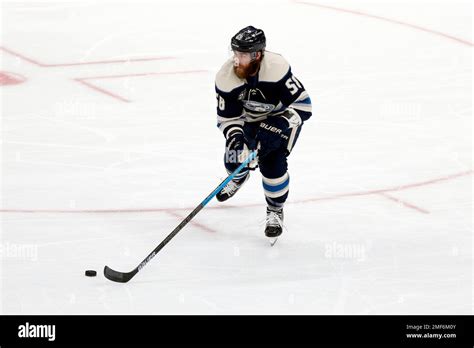 Columbus Blue Jackets Defenseman David Savard Controls The Puck Against