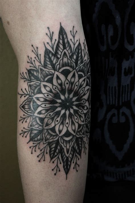 Great Black Colored Mandala Flower Tattoo On Arm Tattooimagesbiz