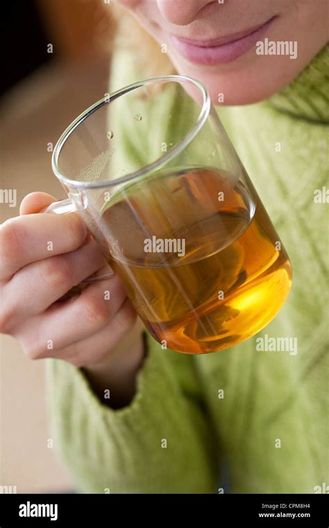 WOMAN WITH HOT DRINK Stock Photo Alamy