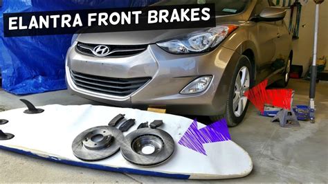 HOW TO REPLACE FRONT BRAKE PADS AND DISC ROTORS ON HYUNDAI ELANTRA