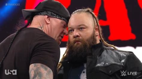 The Undertaker Appears As The American Badass On 1 23 Wwe Raw Sends A Message To Bray Wyatt