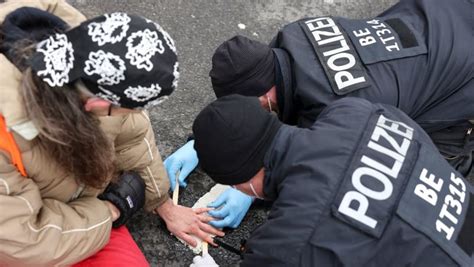 Group of 11 climate activists glue themselves to Berlin motorway - CNA