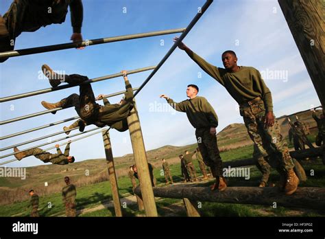 Marines Race Through The Obstacle Course During A Headquarters