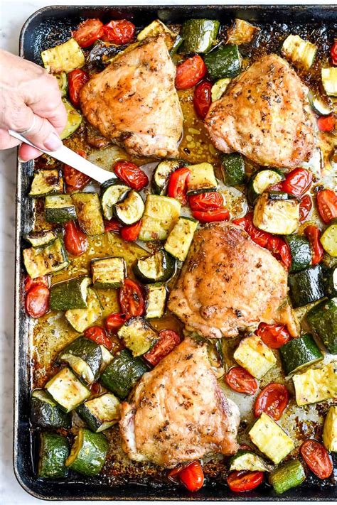 In This Delicious Summery Sheet Pan Dinner Chicken Thighs Are Seasoned