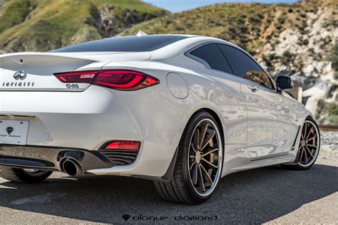 Captivating Infiniti Q60 With White Exterior Color And Bronze Rims