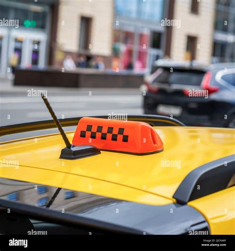 Yellow Taxi Car Roof Sign Close Up Blurred Abstract City Street