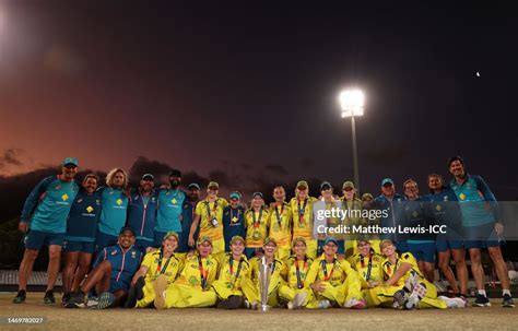 Players And Staff Of Australia Pose With The Icc Womens T20 World