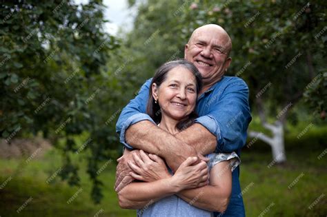 Premium Photo Portrait Of Beautiful Caucasian Senior Couple Hugging