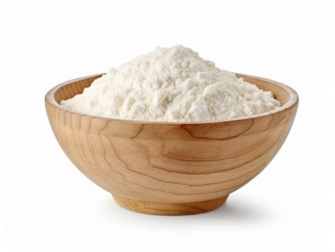 Premium Ai Image A Bowl Of Flour Sits On A White Background