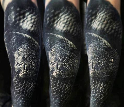 Black Snake Tattoo By Dmitriy Gorbunov Post Snake Tattoo