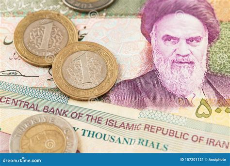 Turkish Lira Coins on Iranian Rial Currency Banknotes. Stock Image ...