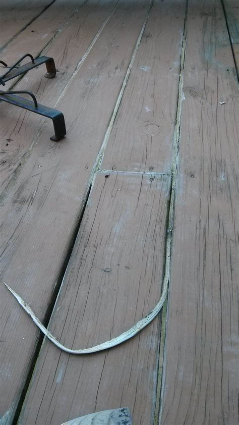 How can I repair and repaint a deck whose planks were caulked? - Home Improvement Stack Exchange