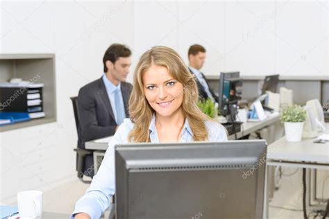 Woman at her office desk Stock Photo by ©franckito 66267773