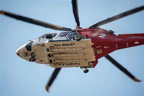 A Lafd Augustawestland 139 Helicopter Makes A Water Drop On A Brush