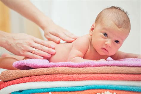 Infant massage stock photo | Ann Arbor Birth & Family