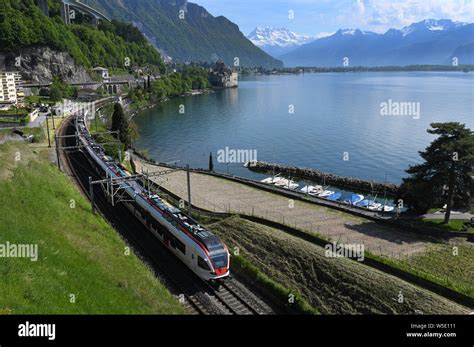 Train Leaving Montreux Railway Station On Lake Geneva In Switzerland