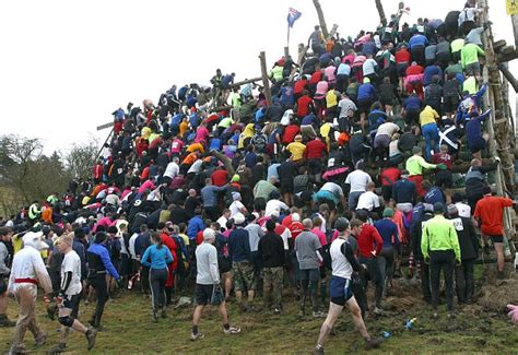 Survival Of The Toughest Thousands Wade Through Mud And Walk On Fire