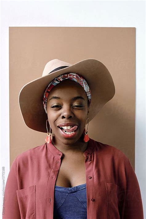 Stylish Black Woman Showing Tongue By Stocksy Contributor Clique